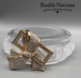Load image into Gallery viewer, Signed Swarovski Gold Plated Crystal Bow Brooch
