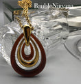 Load image into Gallery viewer, Vintage Retro 1970s Amber Lucite & Goldtone Trifari Three Loop Pendant&Necklace