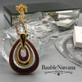 Load image into Gallery viewer, Vintage Retro 1970s Amber Lucite & Goldtone Trifari Three Loop Pendant&Necklace