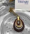 Load image into Gallery viewer, Vintage Retro 1970s Amber Lucite & Goldtone Trifari Three Loop Pendant&Necklace