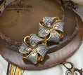 Load image into Gallery viewer, Vintage Signed Swarovski Gold Plated Austrian Crystal Open Ribbon Bow Earrings
