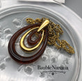 Load image into Gallery viewer, Vintage Retro 1970s Amber Lucite & Goldtone Trifari Three Loop Pendant&Necklace
