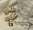 Load image into Gallery viewer, Vintage Crown Trifari Gold Plated & White Glass Cabochon Ribbon Pin&Earrings Set
