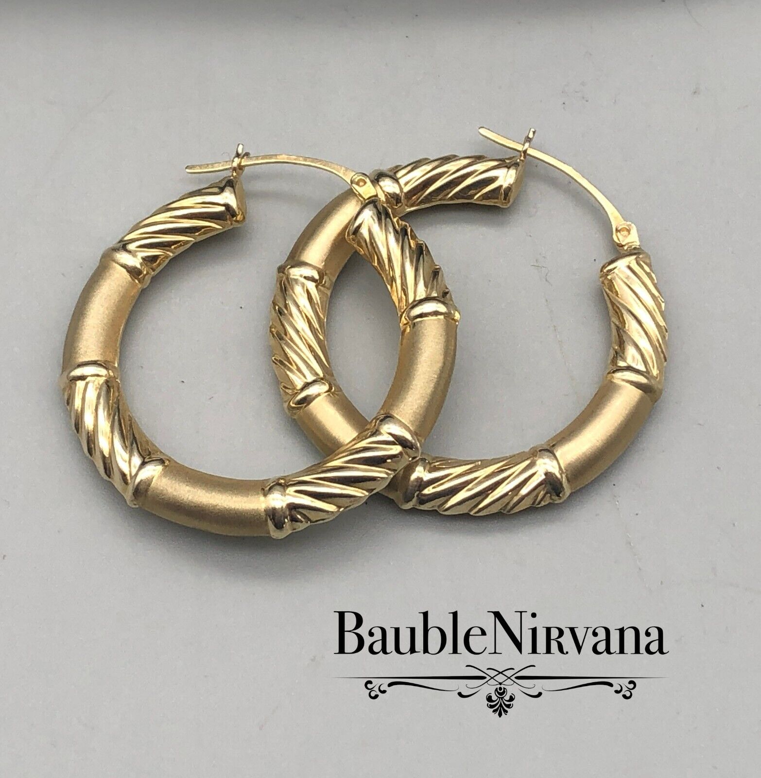 14K Yellow Gold Swirl Hoop Earrings